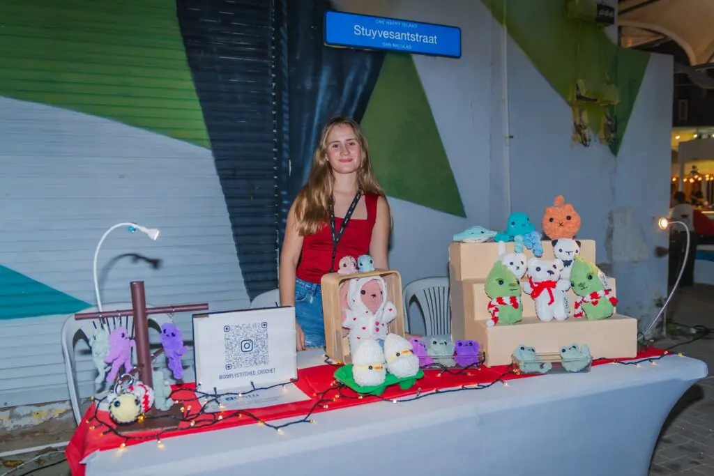 A stallholder with her handmade work at the Christmas Fair
